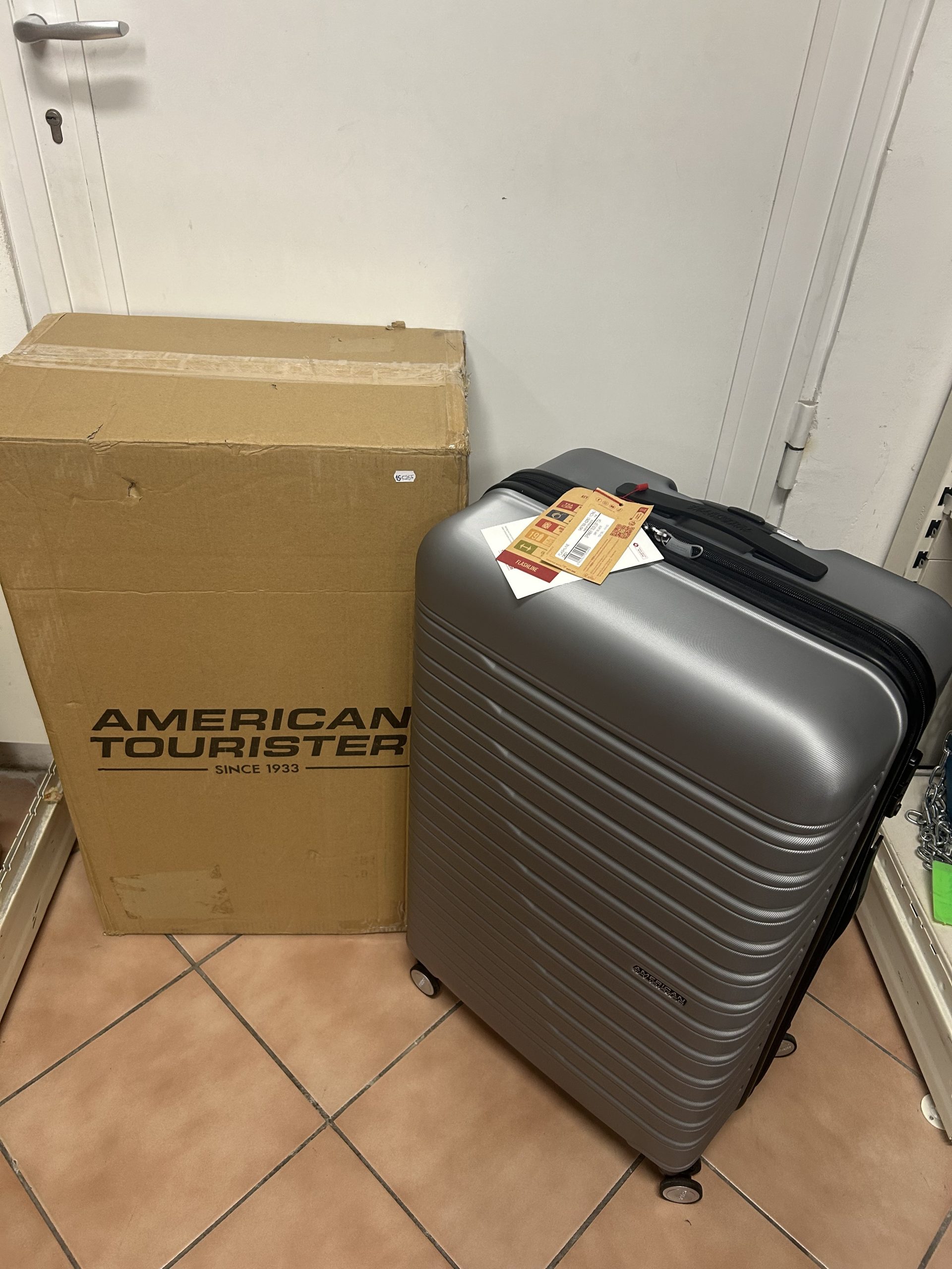 Új! American Tourister bőrönd - 67 cm - bővíthető, kiemelt kép